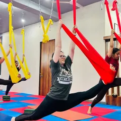 Aerial yoga is where strength meets grace. We guide you to achieve poses you never thought possible, like this full split in the hammock, which builds flexibility and confidence while being gentle on your joints.
