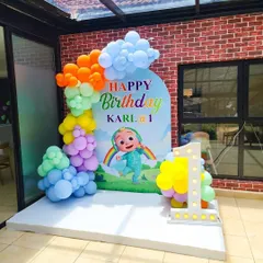 I love bringing popular themes to life, especially for a child's first birthday. This Cocomelon setup features a custom backdrop, a vibrant balloon garland, and a light-up marquee number to make the celebration extra special.