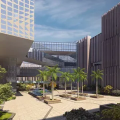 This courtyard at a university in Mohali demonstrates how we integrate green spaces within a dense architectural footprint. The interconnected bridges and walkways create dynamic visual links and physical pathways between buildings, fostering a sense of a unified campus.