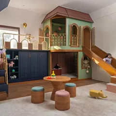 I designed this children's play area as a colorful haven, complete with a custom-built indoor playhouse and slide. The space brings together a vibrant yet soothing pastel palette, creating an imaginative environment for play and creativity.