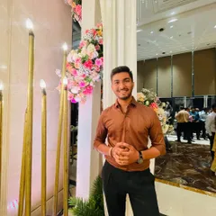 A photo of me at a wedding event. I believe in looking sharp and professional while getting ready for a performance.