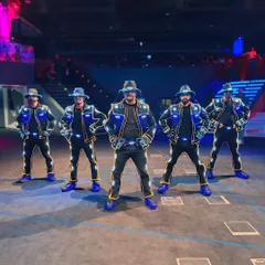 The crew posing on stage at the Doha Festival City. Performing at international venues like this is always an amazing experience for us.