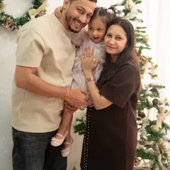 All smiles in front of the Christmas tree. This family's joy is infectious in this happy portrait from my holiday mini-sessions.