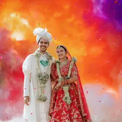 A vibrant explosion of color frames the couple, creating a stunning and modern portrait on their wedding day. This shot combines tradition with a contemporary, artistic flair.