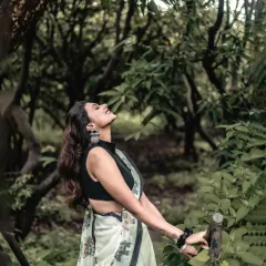 There's a timeless elegance to a saree, especially when set against the raw beauty of nature. I focused on the model's joyful expression and the soft, natural light to create a feeling of classic grace and freedom.