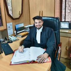 At my desk preparing for a case. The path of an advocate is demanding, but I am dedicated to navigating it with precision and care for my clients.