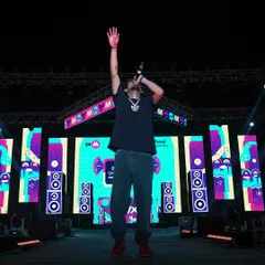 Hyping up the crowd at Parul University. As an MC, I engage directly with the audience, making every performance an interactive and memorable event.