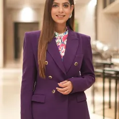 Another portrait in my purple power suit. I believe in dressing for the job you want, and for me, that's commanding the stage.