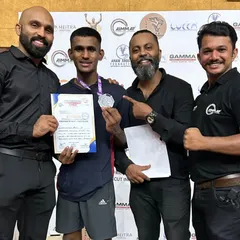 Proud to stand with another one of our winners. This silver medal was hard-earned and represents a significant achievement in his fighting career.
