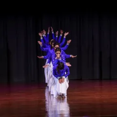 This formation, resembling a multi-armed deity, is an example of the creative and thematic choreography we develop for stage shows. It's a testament to our troupe's coordination and skill.