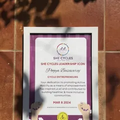 A close-up of the 'She Cycles Leadership Icon' award. It acknowledges our work in building a healthier and more inclusive community through cycling.