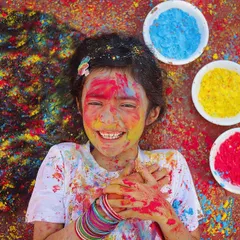 The pure joy of Holi! This older child is having a blast, covered in bright colours. These sessions are so much fun and capture the true spirit of the festival.