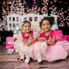 Come on Barbie, let's go party. This themed sibling shoot brings a world of pink and sparkle to life.