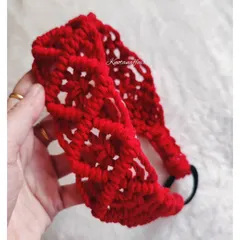 This intricate, lacy macrame headband is for those who love unique hair accessories. It's made with a beautiful bright red cotton cord and has an adjustable elastic band at the back for a perfect, comfortable fit.