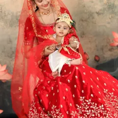 A beautiful themed photoshoot celebrating the bond between a mother and her baby, inspired by the story of Yashoda and Krishna.
