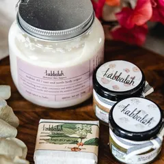A summer giveaway collection. This beautiful assortment includes a body yogurt, coffee soap, and other handmade goodies perfect for the season.