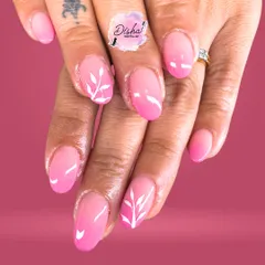 Pretty in pink. This lovely set features a pink ombre base with delicate, hand-painted white leaves for a fresh and feminine look.