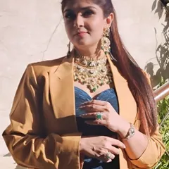 A full view of the festive jewelry look, demonstrating how to layer bold pieces for a majestic touch.