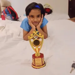 The sweet taste of success. Ghanavi with her Quarter Finalist trophy, a reward for her perseverance and skill on the national stage.