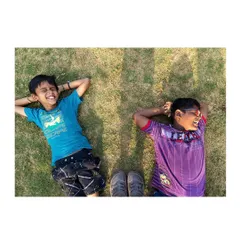 Pure, uninhibited joy is the ultimate goal of a community park. Two young residents of the Worli Fishing Village relax on the new lawn, a simple pleasure made possible by revitalizing this essential public open space.