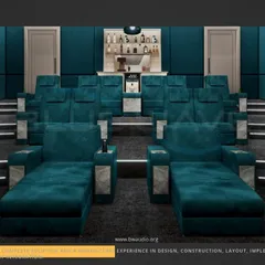 We designed this unique theater with a combination of tiered recliners and front-row chaise lounges in a striking teal fabric. This layout offers flexible, luxurious comfort, complete with a built-in mini-bar for the ultimate convenience.