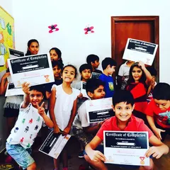 A proud moment for our students as they receive their Certificates of Completion at the end of a coding camp. We believe in celebrating every milestone in a child's learning journey to build their confidence.