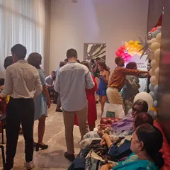 Guests mingling and enjoying the food at a birthday party I catered. It brings me so much joy to see people having a great time while I take care of the food.