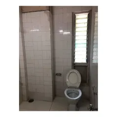 This is what the bathroom looked like before the renovation. By redesigning the layout and updating all the materials and fixtures, we were able to completely transform it into a modern and luxurious space.