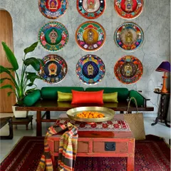 This is the complete Navagraha series, a commission that turned nine discarded clock frames into a celestial wall installation. Each frame is a hand-painted homage to one of the nine planets of Vedic astrology, a testament to how bespoke art can transform a space.