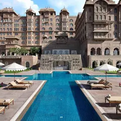 The magnificent poolside of the Fairmont in Jaipur. This venue combines modern luxury with the stunning architecture of a Rajasthani palace, perfect for a royal wedding.