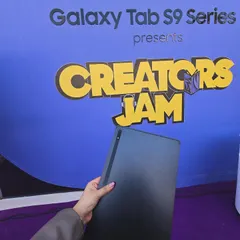 A close-up of the sleek Samsung Galaxy Tab S9. This shot focuses on the product's design, highlighting its premium feel for a tech-savvy audience.