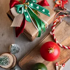 My handmade bauble candles look wonderful as part of a festive display. Here they are styled with a beautifully wrapped gift, ready to bring some Christmas cheer.