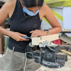 There's something special about using hand tools. It's a direct connection between you, the tool, and the wood. Here, a participant is carefully chiseling a joint, learning a skill that's been passed down for generations. It takes patience, but the result is so worth it.