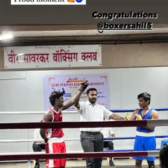 The moment of victory. The referee raises Sahil's hand after a hard-fought win at the Guru Purnima tournament. This feeling is what we chase every day in the gym.
