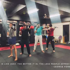 As the quote says, "Boxing is like jazz. The better it is, the less people appreciate it." Here's a group of students practicing their form, creating their own rhythm.
