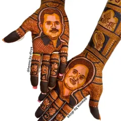 A close-up of the parent portrait mehendi, showing the incredible detail and likeness I strive to achieve. This is a truly unique way to keep your loved ones close on your special day.