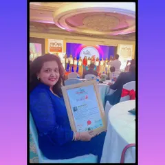 A candid moment from the World Women Leadership Congress & Awards ceremony. Holding this award was a surreal experience, a testament to the journey I've been on since I decided to pursue tarot reading professionally.