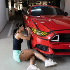 Getting the details right on the headlights of the cartoon-style Mustang.
