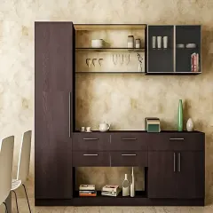 A sleek and minimalist crockery unit in a dark wood finish. The design includes a tall pantry, drawers, and glass-fronted upper cabinets, offering a variety of storage options for a dining area.