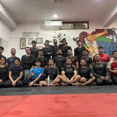 All smiles after a tough session. The discipline is serious, but the camaraderie is real. This is what our community looks like at the end of a training day.
