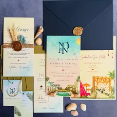 For Nistha and Prajval's destination wedding in Goa, we designed a complete stationery suite that captured the essence of a beach celebration. The set includes watercolor illustrated cards, a welcome note with a custom wax seal and seashell details, and matching gift tags.