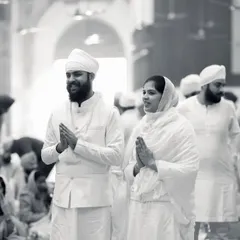 The serenity of the Gurudwara envelops this beautiful Sikh couple as they seek blessings for their journey together during their Anand Karaj.