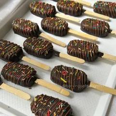 Another view of the chocolate cakesicles, all lined up and ready to be packed. The combination of cake and chocolate shell is just irresistible.