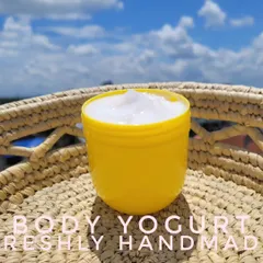 My Body Yogurt pictured against a beautiful blue sky. It’s the perfect lightweight moisturizer with SPF to protect your skin while you are out and about.