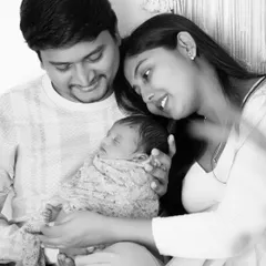 This black and white conversion brings out the emotion and connection in this relaxed family moment.