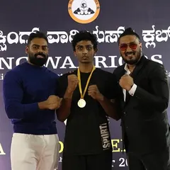 Hard work earns results. I'm proud to stand with one of my students after he earned his medal at a local boxing event.