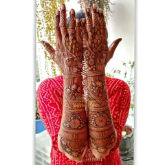 A heavy Indian back-hand design with a mix of peacock, floral, and geometric patterns, offering a classic and full look.