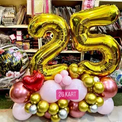 Celebrating a 25th birthday is a big deal, and this custom balloon bouquet is one of my most requested items. It features large foil numbers and a coordinated color palette of gold, pink, and rose gold, perfect for photos.
