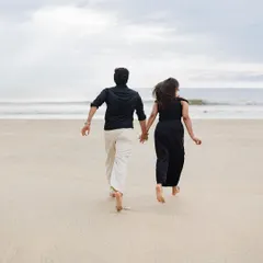 Let's run towards our future together. A candid, in-motion shot from a fun and energetic Goa pre-wedding session.
