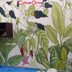 We brought this vibrant, tropical jungle to life with a completely freehand painted mural. This type of custom wall art allows for unparalleled creativity, turning a plain wall into a one of a kind masterpiece that reflects your personal style.